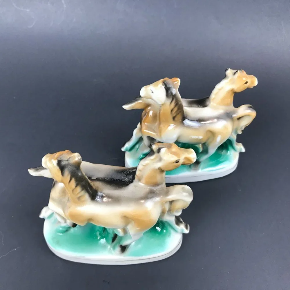 Two small antique horse figurines marked occupied Japan